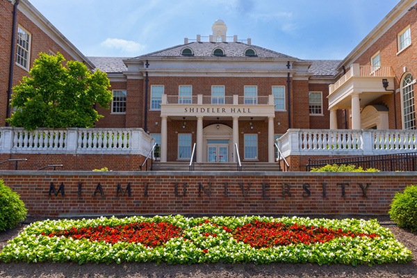 flowers growing in front of shideler hall