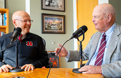 President Crawford talking with Mike Brown
