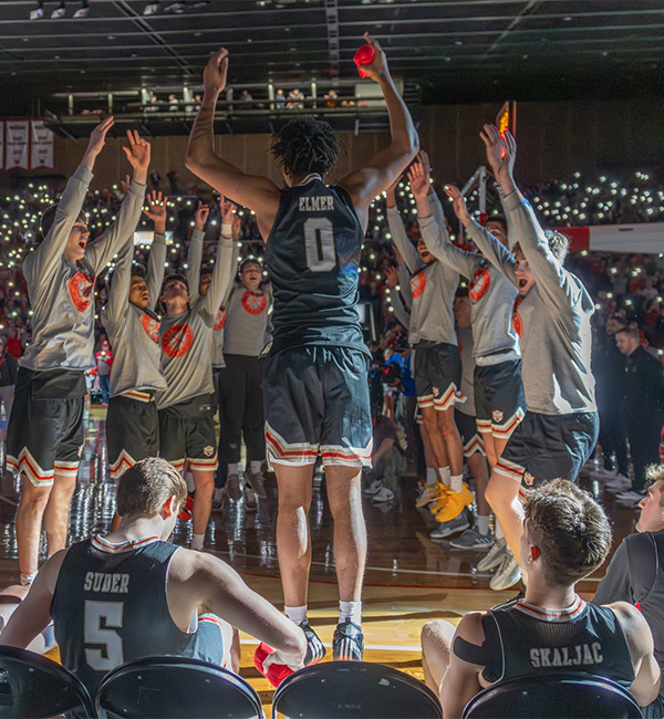 Miami basketball team coming onto the court