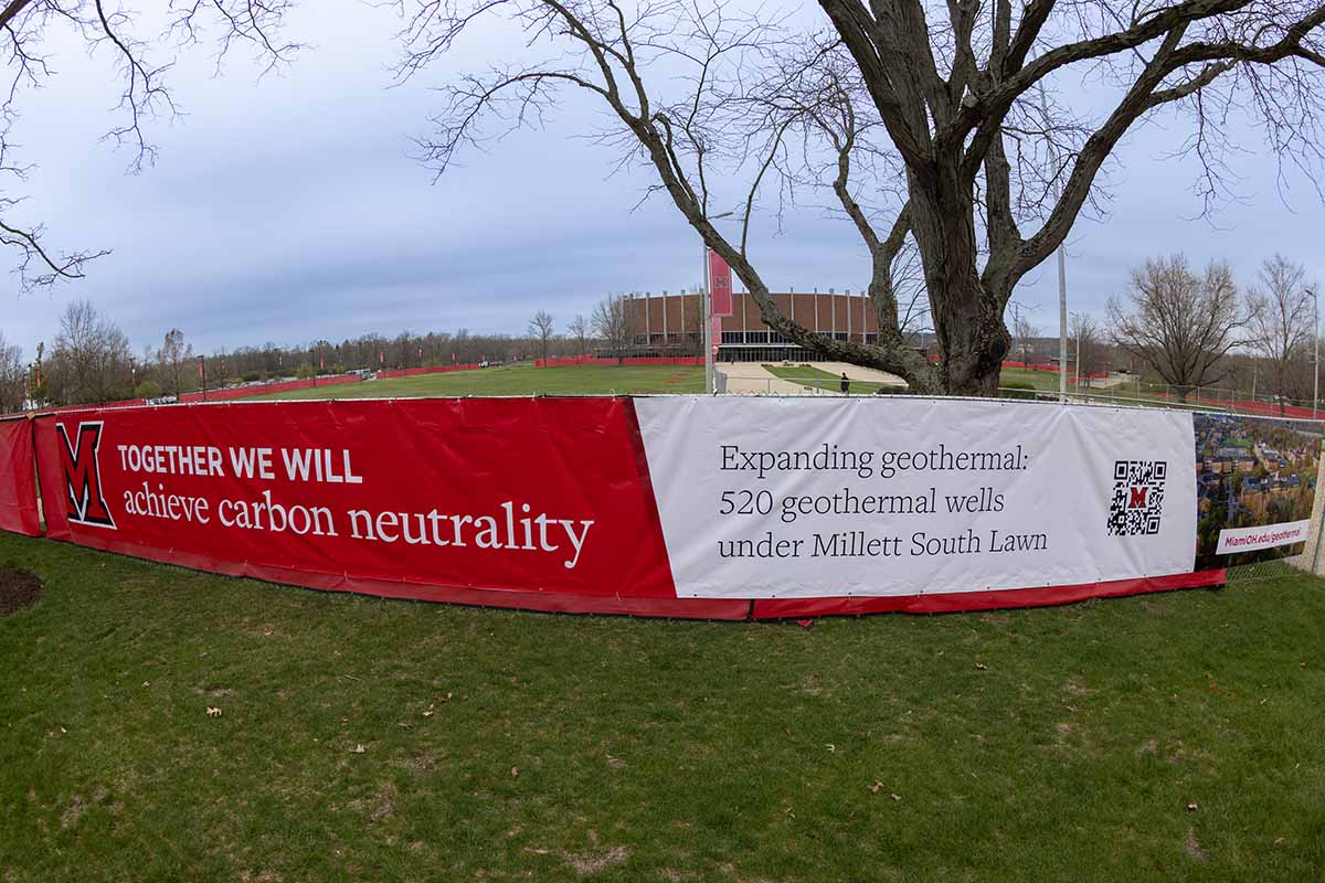 informational banner on construction fence