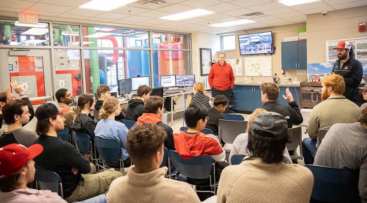 Larry Davidson talks to students in western geothermal plant