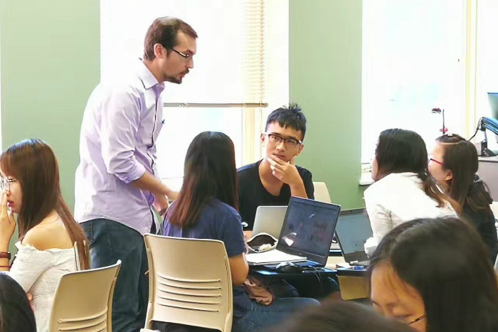 Students in a classroom participating in Global Partner School