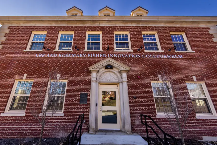 exterior of the college at elm building