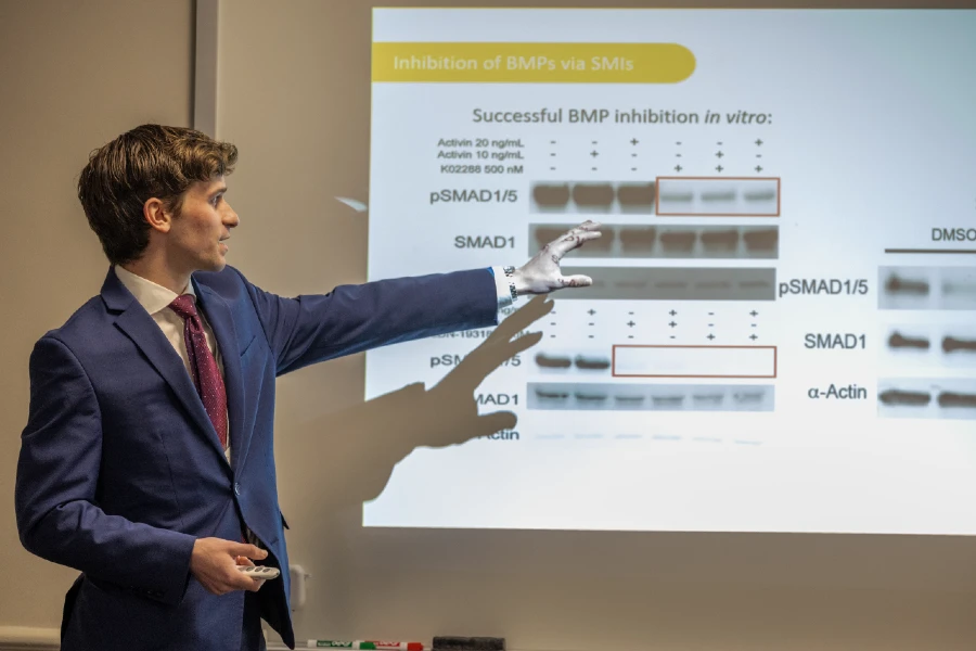 student presenting a powerpoint