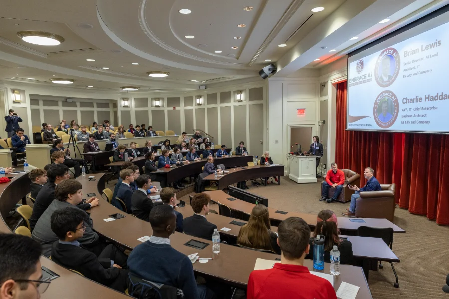 a room full of people attending an AI conference