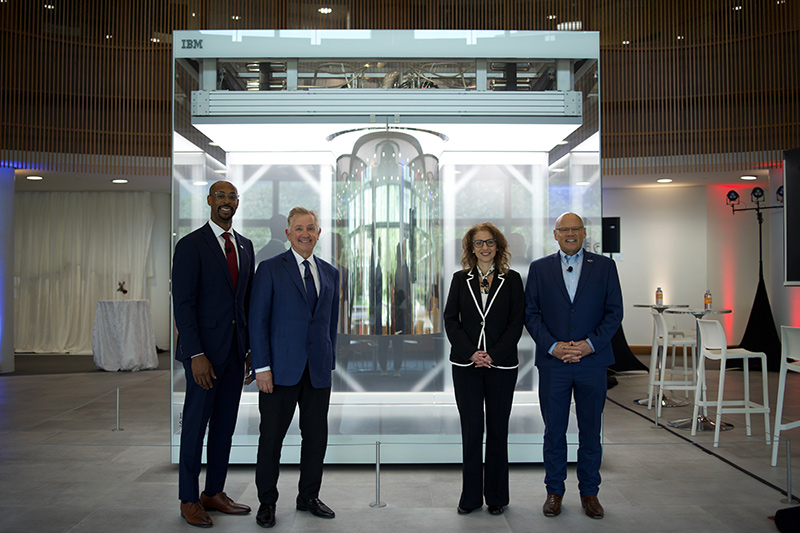 Miami University President Gregory Crawford and Cleveland Clinic leadership in front of Cleveland Clinic houses an IBM Quantum System One, the world’s first quantum computer fully dedicated to healthcare research