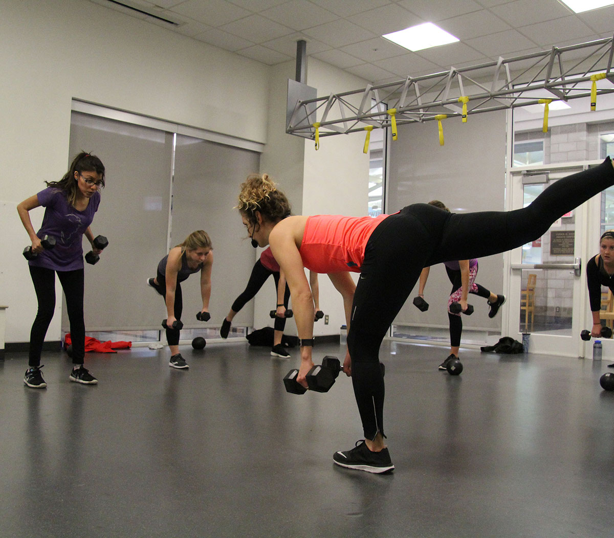 A Miami student teaching a fitness class at the Rec Center