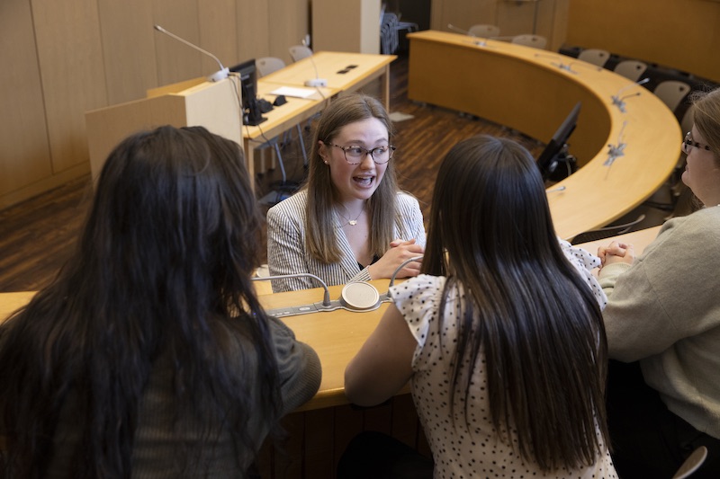 Joslin Senate Chamber with Students Talking Together