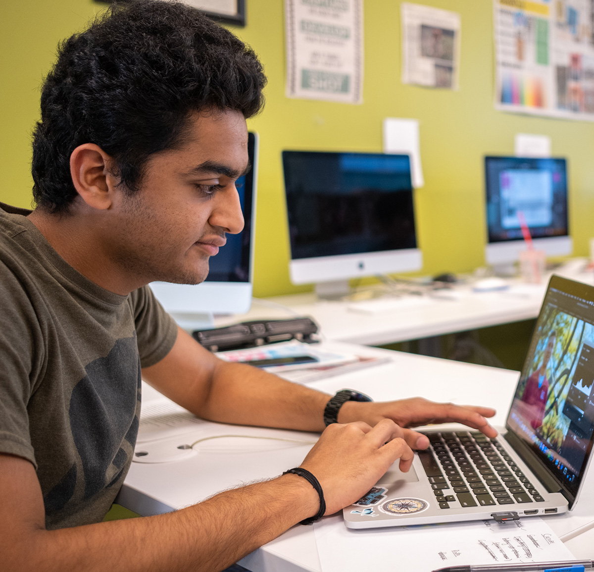 Male student working on a computer