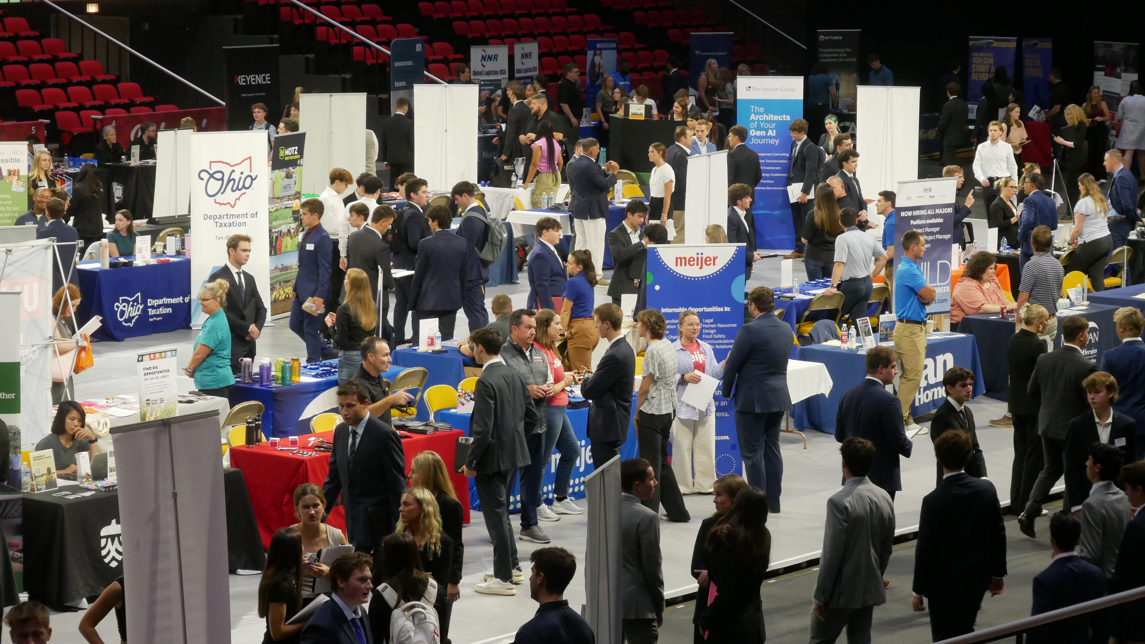 The Millett Hall packed with employers and students during a career fair.