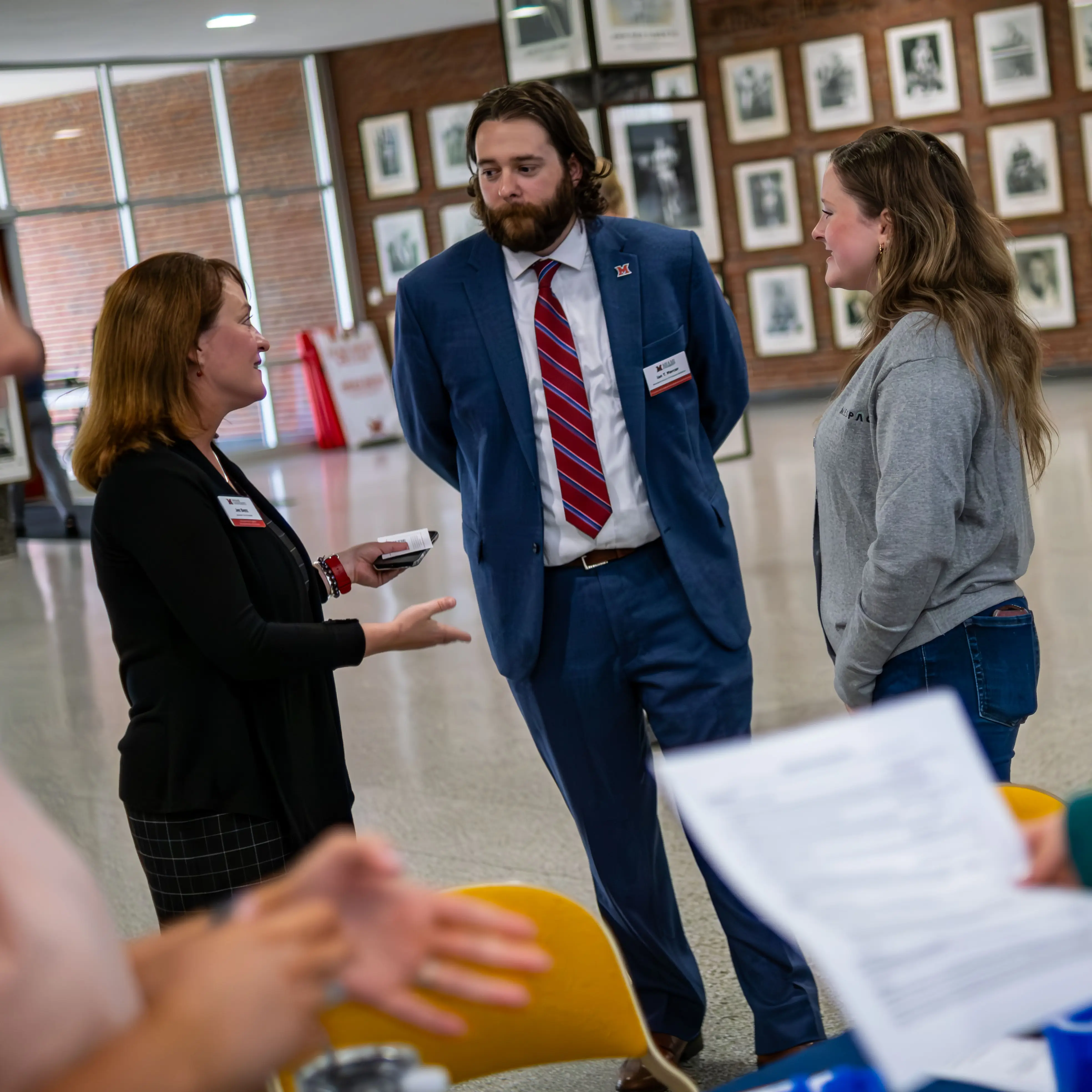 Career Fair staff speaking with employer partners