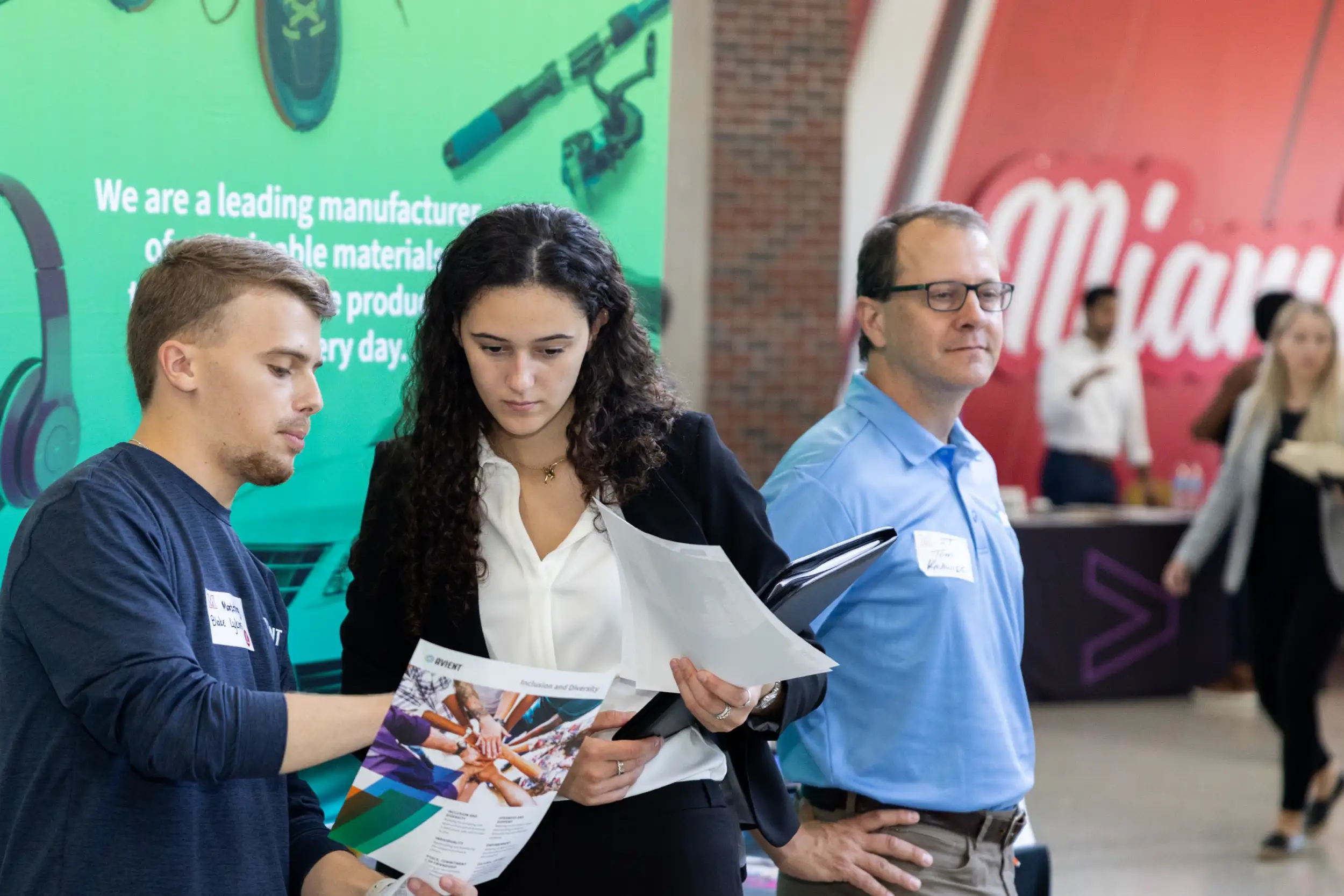 Employer discussing recruiting with a Miami student