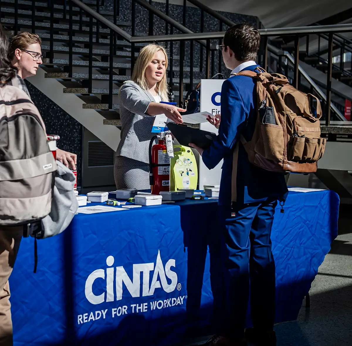 Miami student networking with a recruiter representing Cintas