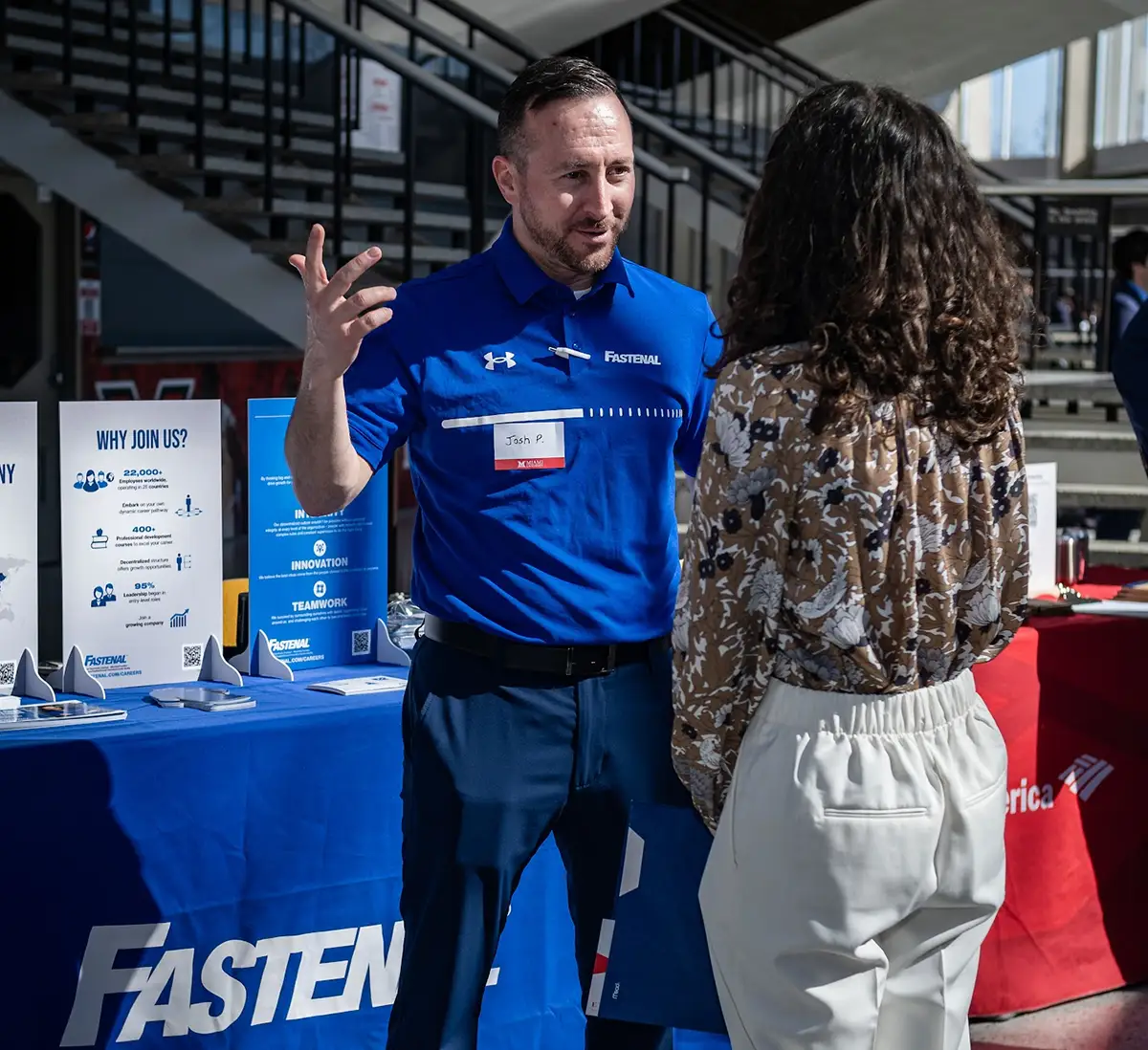 Student interviewing with a representative from Fastenal