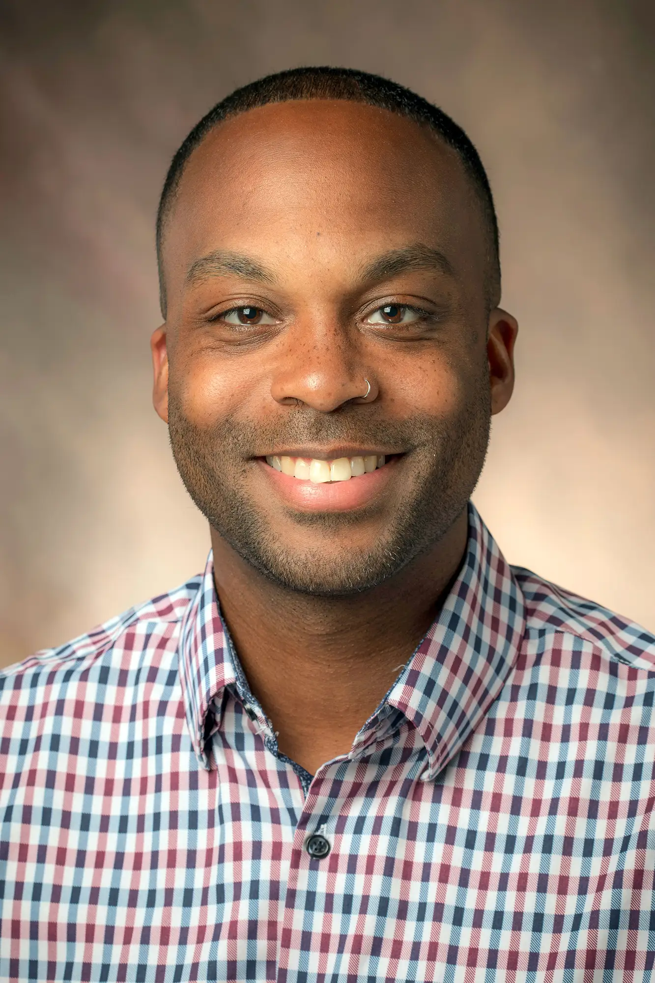 A headshot photo of Calvin McDaniel.