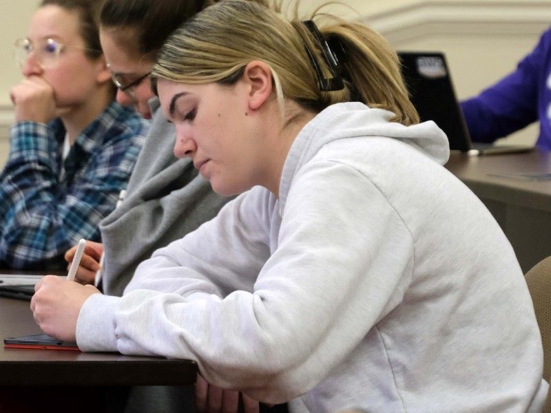 Accounting student working in a classroom