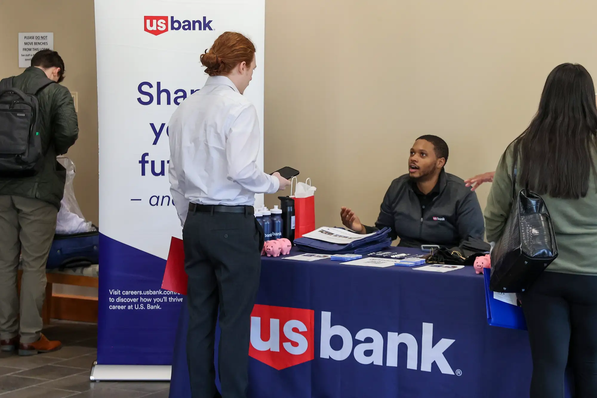 Students meeting an employer and networking