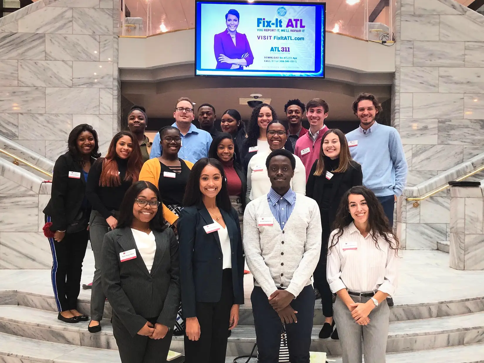 Miami students posing for a photo at a Career Academy employer visit