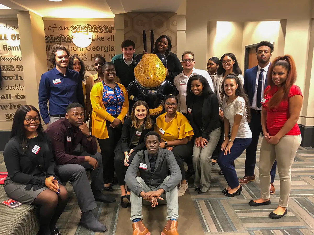 Miami students posing for a photo at a Career Academy employer visit