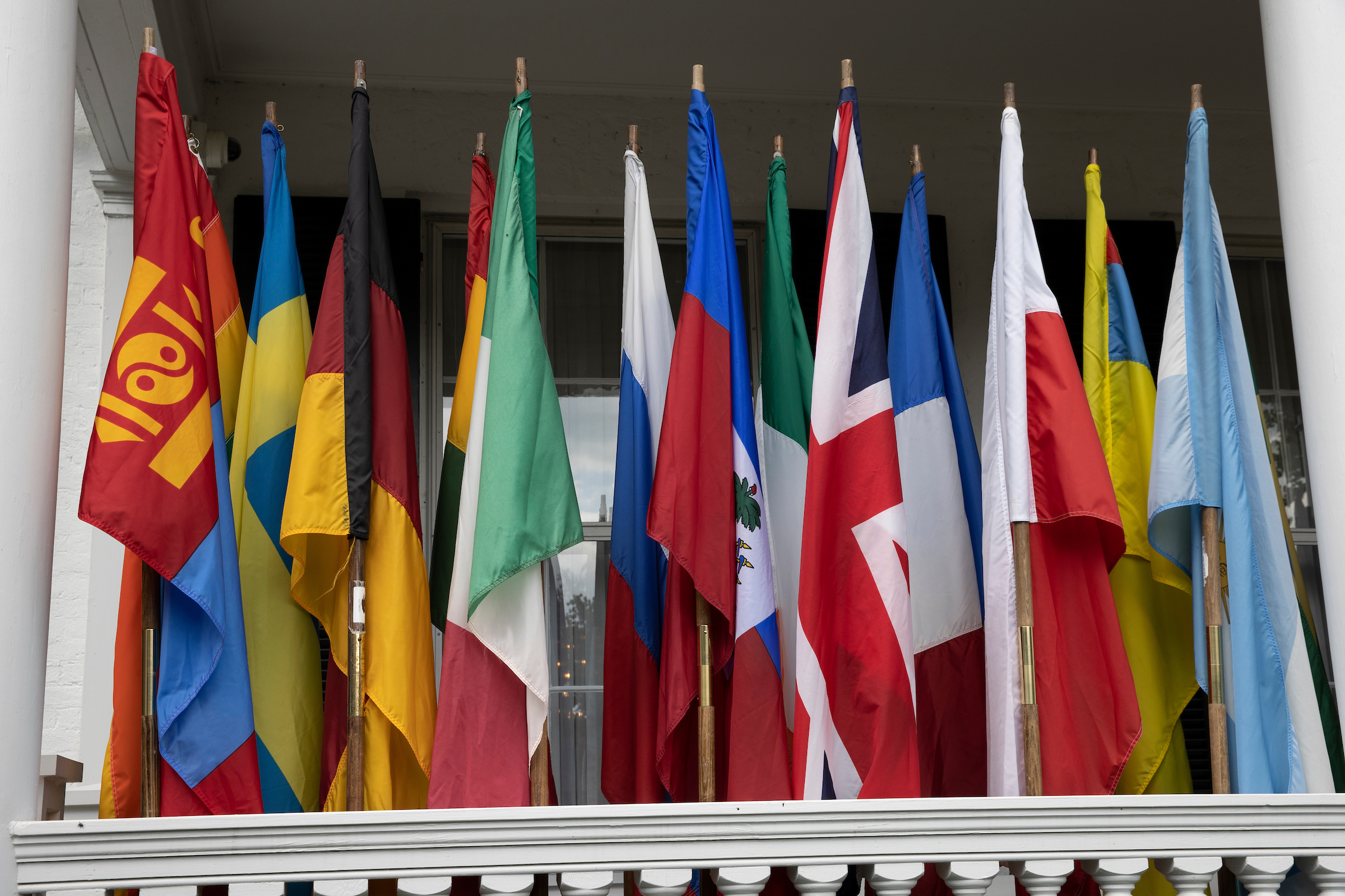 Flags from many countries line the entrance of Lewis Place.