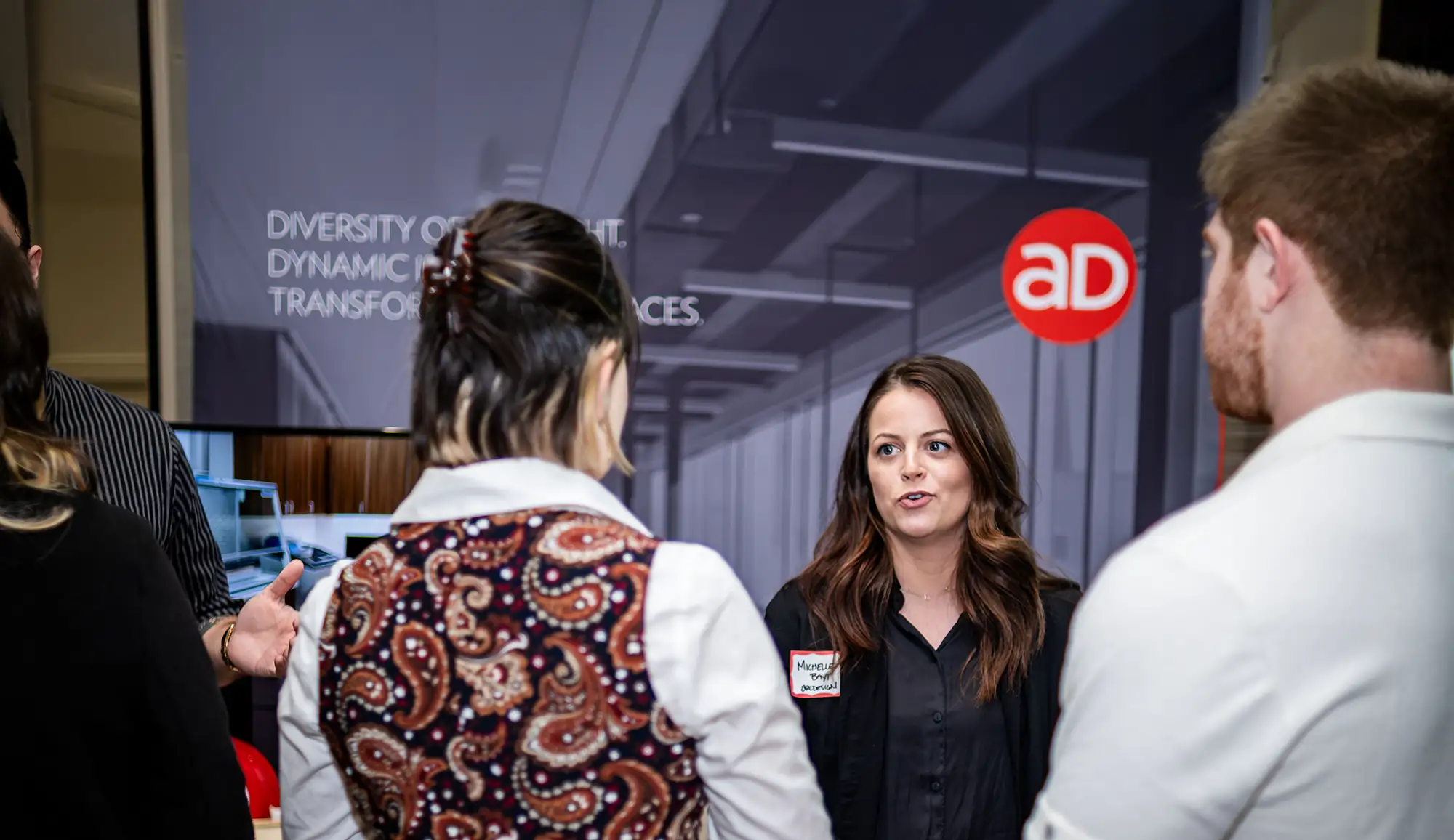 Employer networking with Miami students at the Architecture + Design Career and Internship Fair