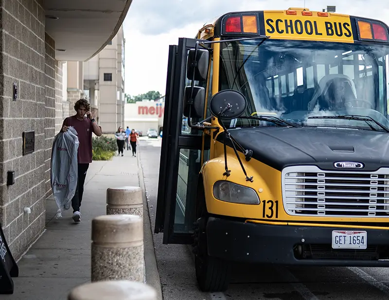 Bus pulling into JCPenney parking lot