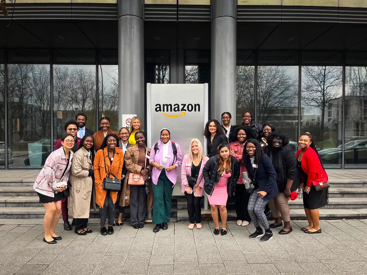 Career Academy participants pose in front of the Amazon.eu headquarters.