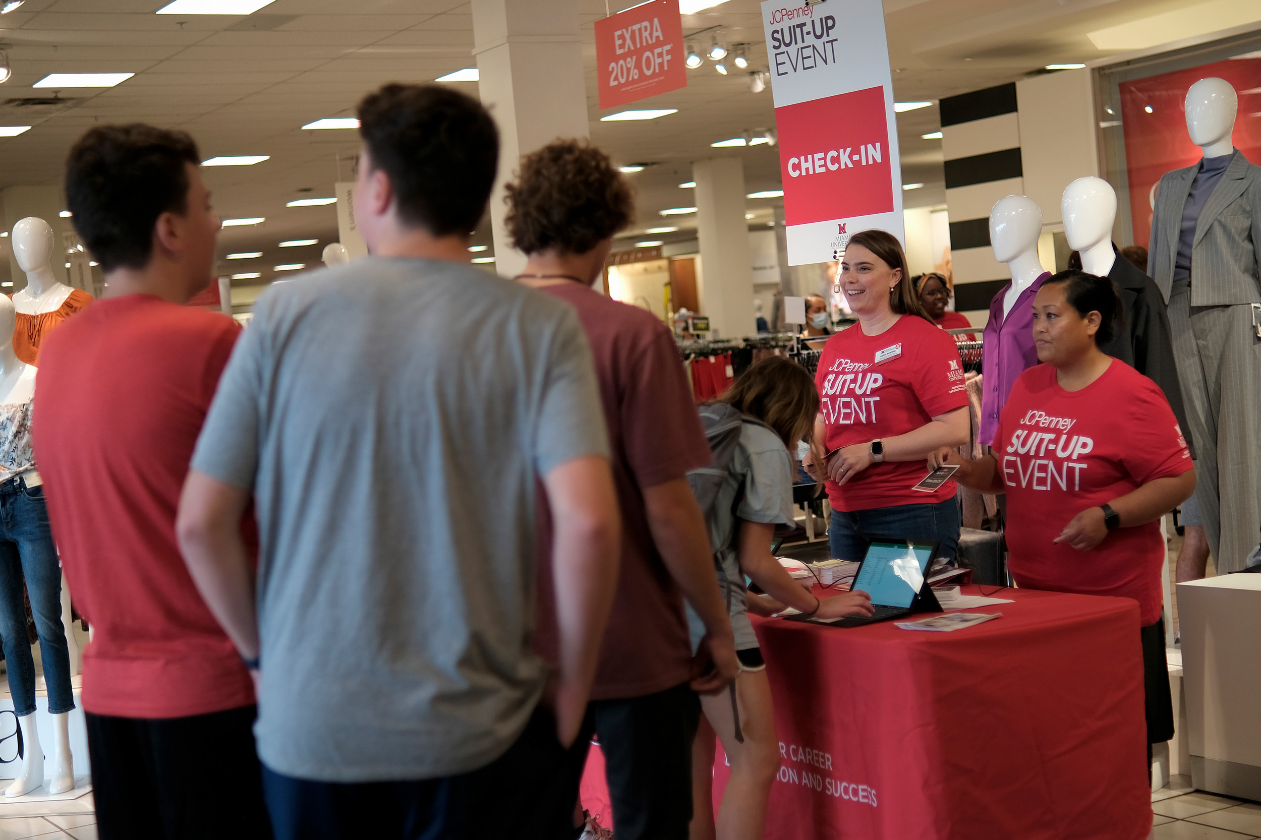 Students stand in line at a JCPenney Suit-Up Event.