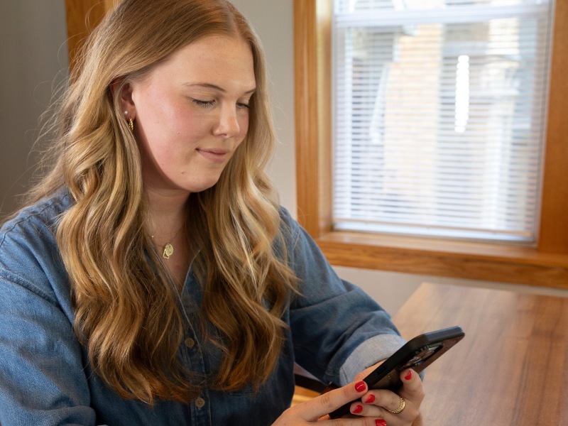 A student looking at her phone.