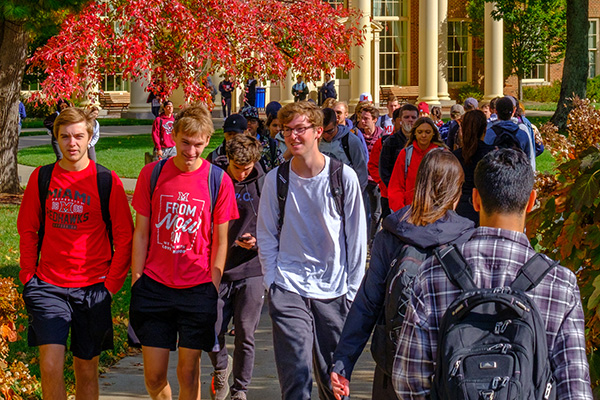 Students walk to class in the fall.