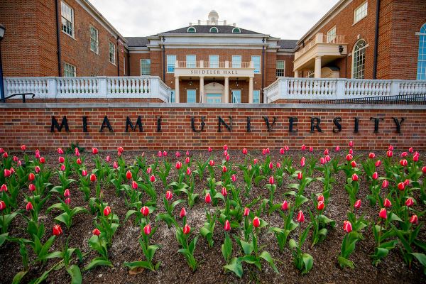 Shideler Hall with red tulips