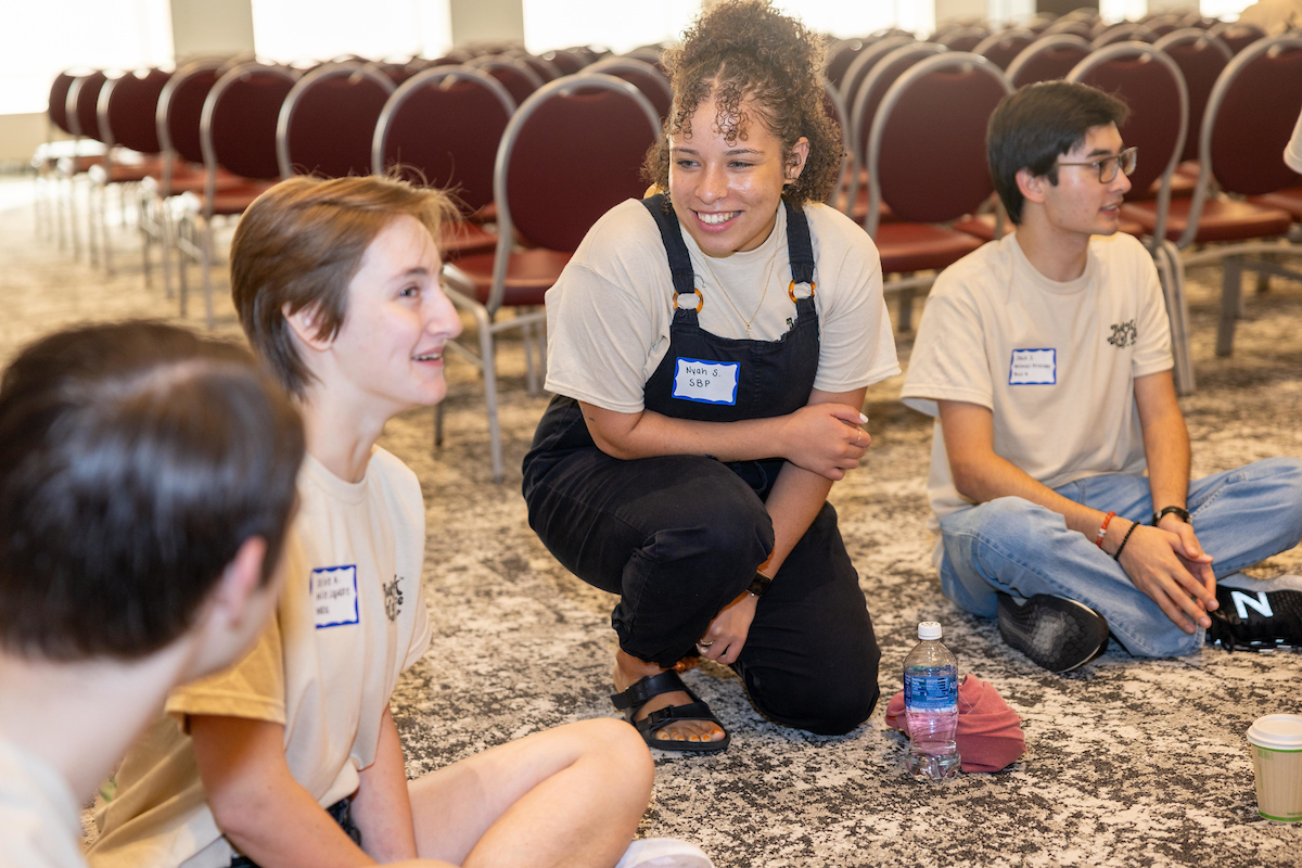 student body president Nyah Smith talking to students in Armstrong on the RedHawk Day of Service. 