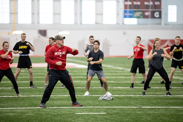 students exercising with Greg and Renate Crawford