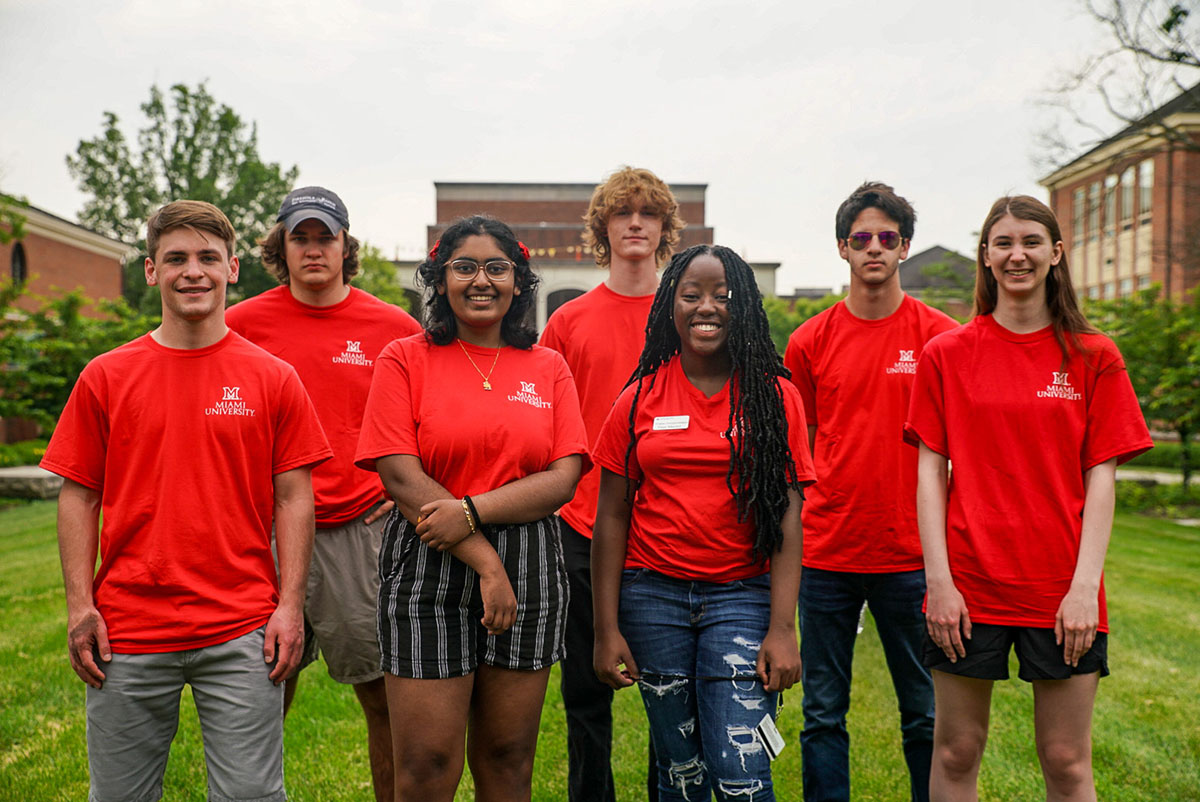 A group of residence hall leaders smiling together