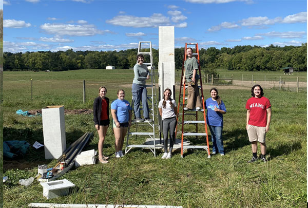 Chimney swift tower and students 