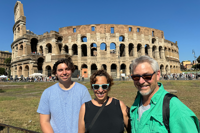 Eyster family, including mother, father, and son, in front of the Roman Forum.