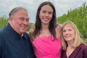 The Conway Family. Two parents and a daughter.