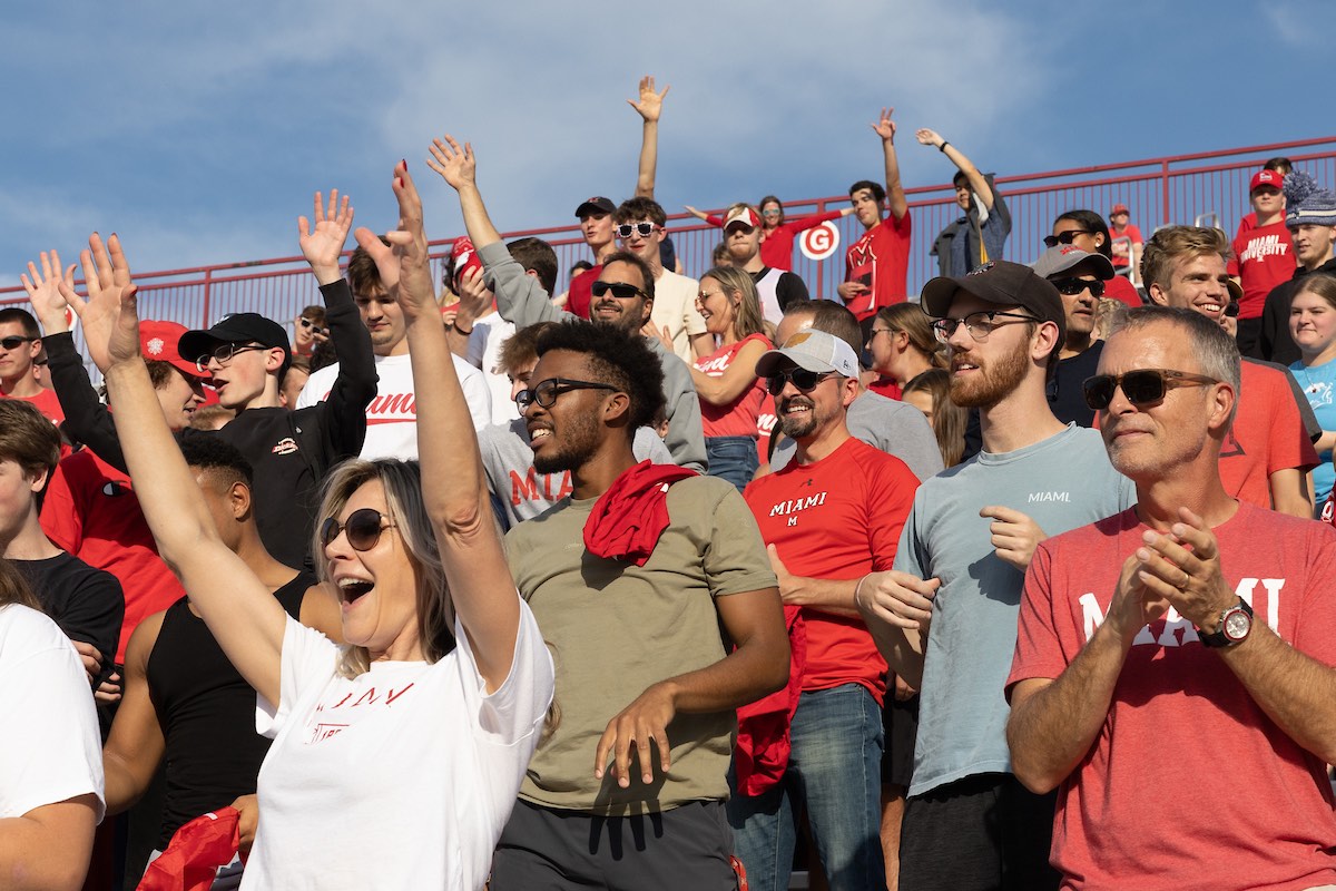 crowd of people at a Miami RedHawks football game.
