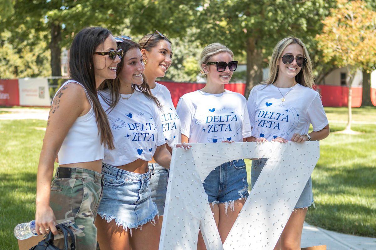 Five women tabling about Delta Zeta at mega fair.