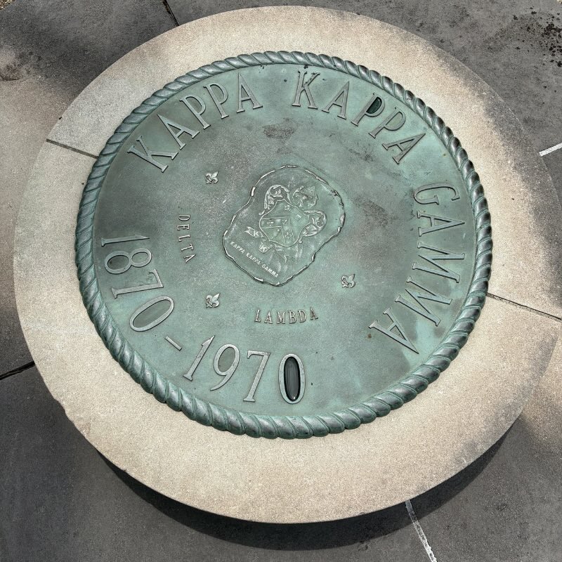 Close up of the Kappa Kappa Gamma Seal. Delta Lambda. 1870-1970. 