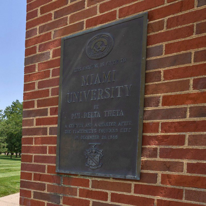 Plaque with seal that reads This gateway is given to Miami university by Phi Deta Theta A century and a quarter after the fraternity's founding here on December 26, 1848.