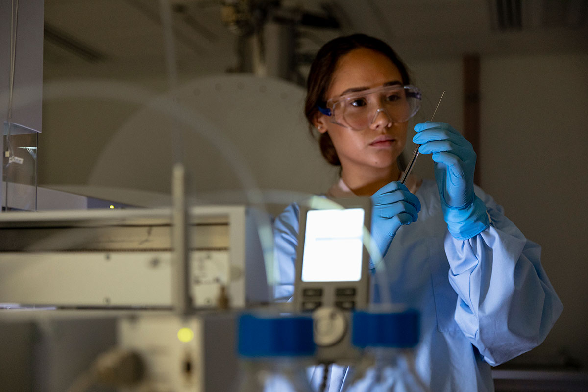 Master of Science in Clinical Engineering student working in the lab.