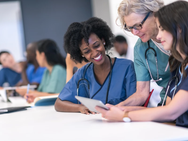 Nurse Practitioner student with faculty member.