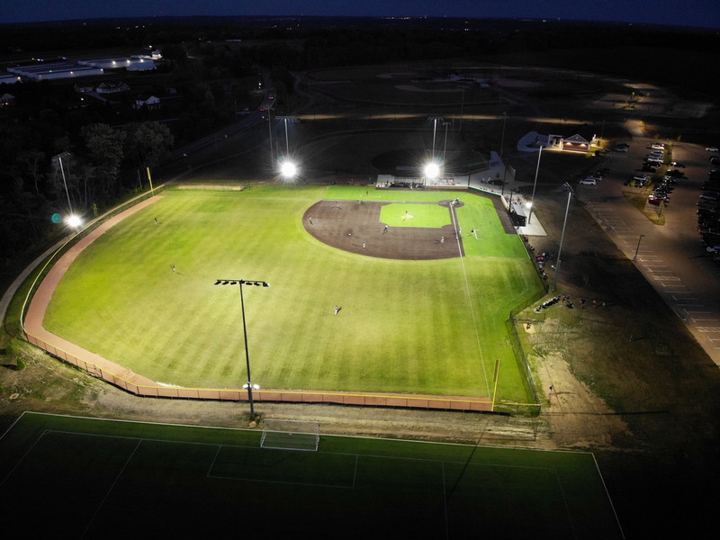 ThunderHawks player at the plate swinging his bat at Rathman Field