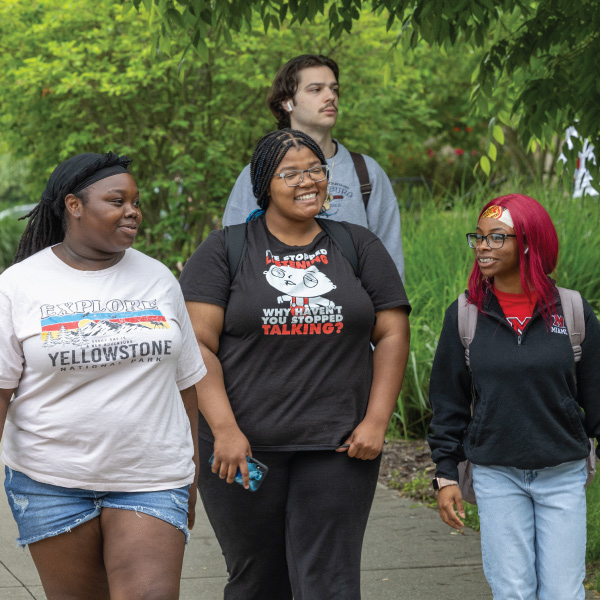3 students walking after class.