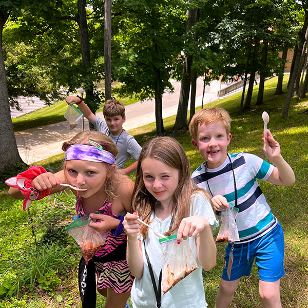 A group of campers exploring a nature trail