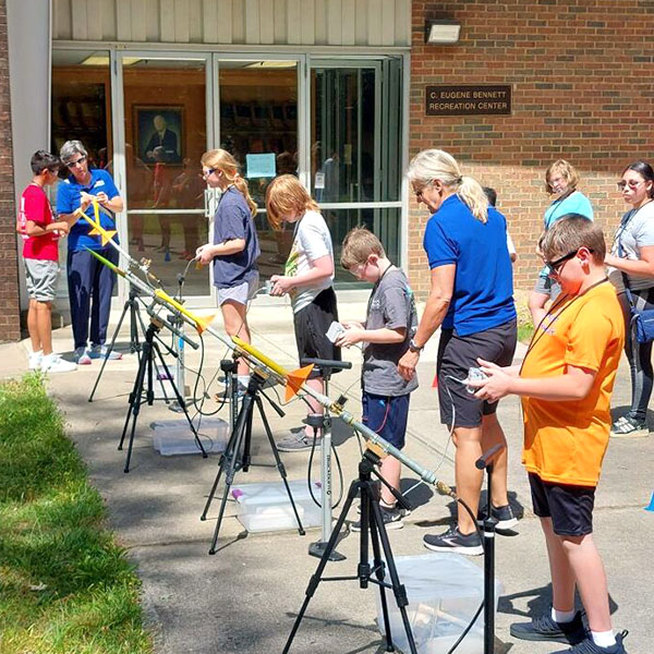 Campers launching rockets