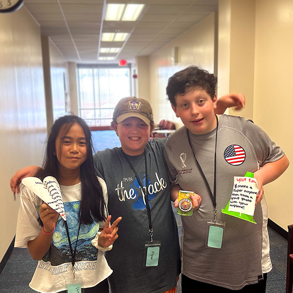 A group of campers with a compass