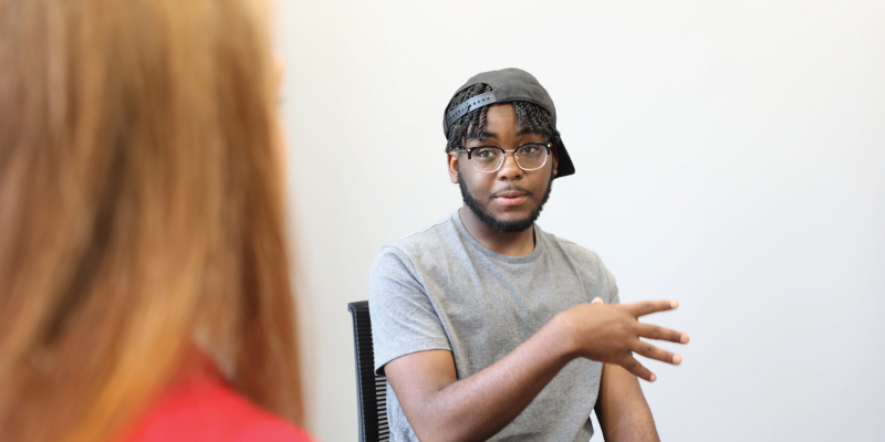 Student meeting with a counselor.