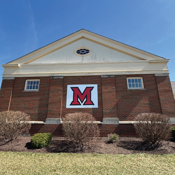 Voice of America Learning Center exterior with block M branding 